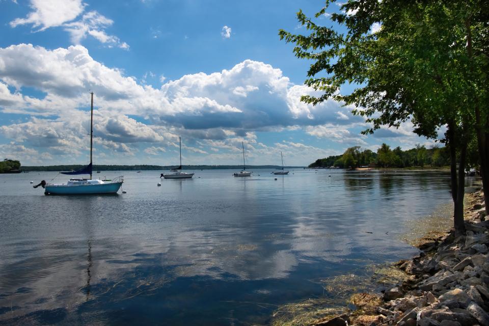 Sail boats are moored on Big Green Lake near Hattie Sherwood Park in Green Lake. With a maximum depth of 236 feet, Big Green Lake is Wisconsin's deepest natural inland lake.