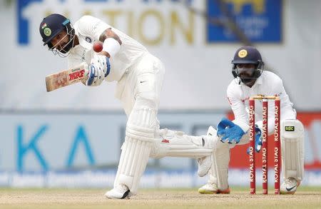 Cricket - Sri Lanka v India - First Test Match - Galle, Sri Lanka - July 29, 2017 - India's captain Virat Kohli in action. REUTERS/Dinuka Liyanawatte