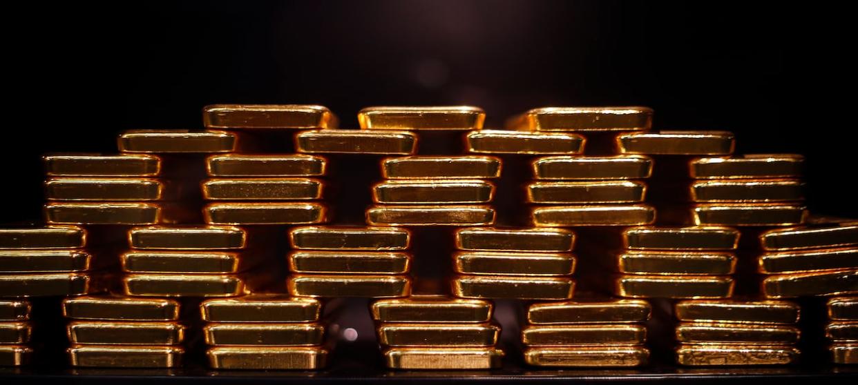 Gold bars are stacked at a safe deposit room of the ProAurum gold house in Munich on March 6, 2014. On April 17, 2023, 400 kilograms of gold were allegedly stolen during a headline-making theft that occurred at Toronto's Pearson airport.  (Michael Dalder/Reuters - image credit)