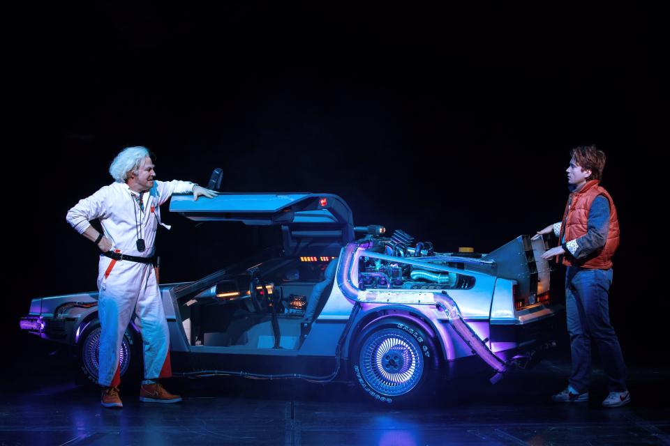 Roger Bart as Doc Brown, left, and Olly Dobson as Marty McFly in West End production of "Back to the Future." The musical's North American tour will launch from Playhouse Square in Cleveland June 11 to July 7, 2024.