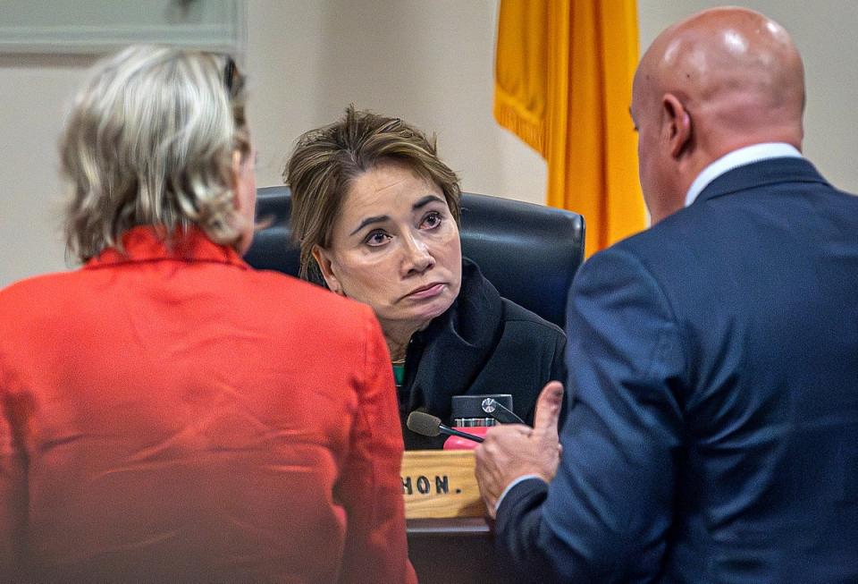 Judge Mary Marlowe Sommer listens to prosecutor Kari Morrissey and defence attorney Jason Bowles discuss testimony by firearms expert Frank Koucky III during the Hannah Gutierrez-Reed involuntary manslaughter trial (POOL/AFP via Getty Images)