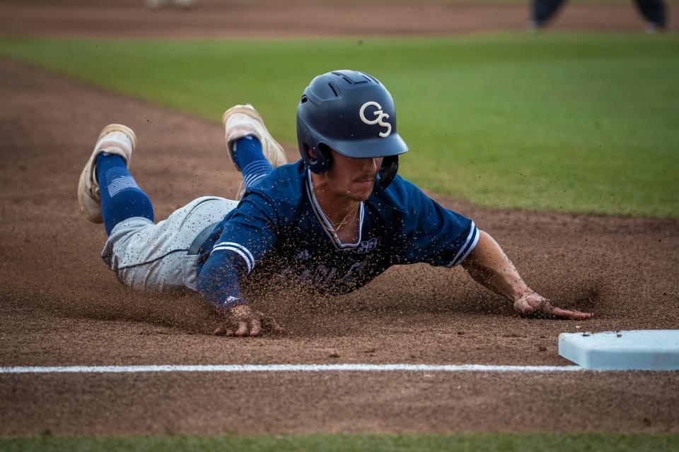 Georgia Southern's Jarrett Brown of Savannah slides into third base following a wild pitch during the second inning against Texas Tech on Sunday in the Statesboro Regional at J.I. Clements Stadium. Texas Tech won 3-1 to eliminate the Eagles.