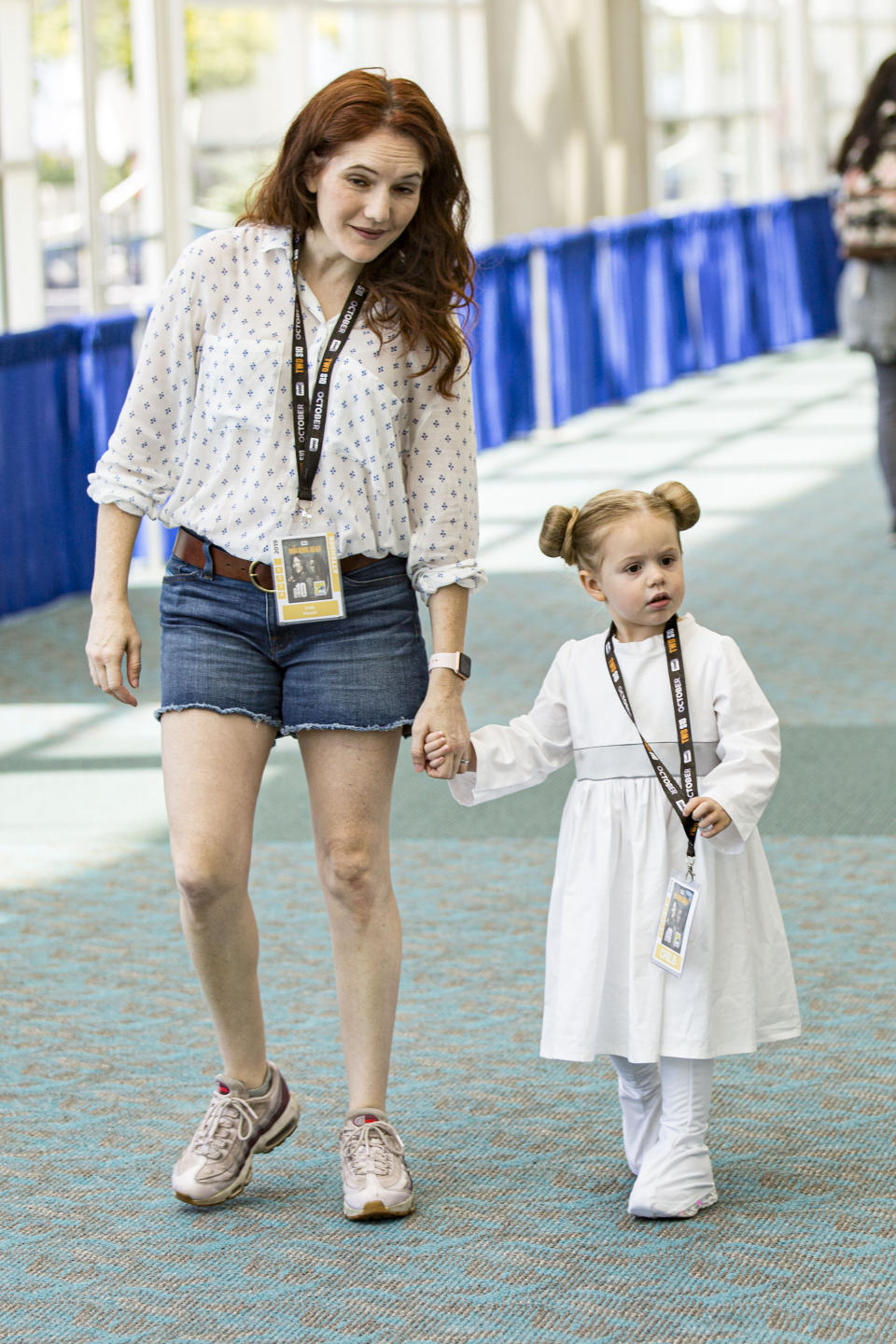 A young girl dressed as Princess Leia from "Star Wars."