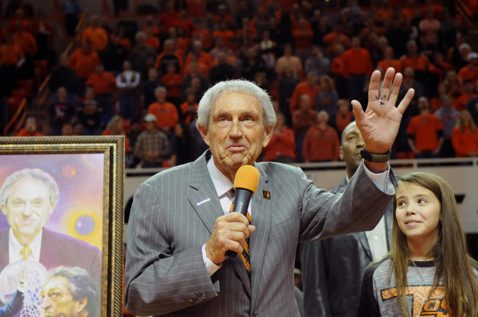 Eddie Sutton, head coach at Oklahoma State between 1990-2006, is honored at half time of the Oklahoma State basketball game against Iowa State in Stillwater, Okla., Monday, Feb. 3, 2014. (AP Photo/Brody Schmidt)