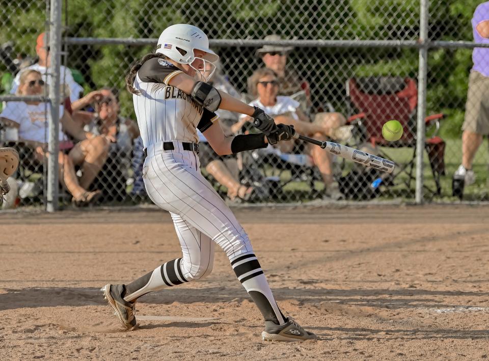 Cowan softball's McKenna Minton bats in the team's regional championship game against Tri at Cowan High School on Tuesday, May 30, 2023.