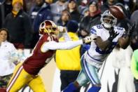 Dallas Cowboys wide receiver Dez Bryant (88) catches the ball as Washington Redskins cornerback Will Blackmon (41) defends in the fourth quarter at FedEx Field. The Cowboys won 19-16. Mandatory Credit: Geoff Burke-USA TODAY Sports
