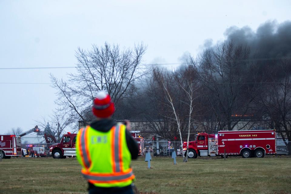 Smoke wafts over the horizon from the fire at C6-Zero on Dec. 8, 2022, in Marengo.