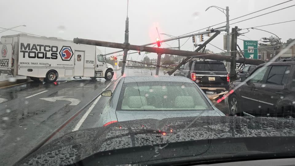 Drivers were stranded after electrical poles fell on their cars in Westminster, Maryland. - Courtesy Jeffrey Campbell