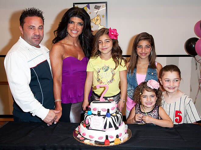 Her career was riding high, but Giudice's personal life hit a low as she and Joe continued to struggle with their bankruptcy filing. A sale of their personal effects was scheduled and then canceled amid claims that they had hidden assets and undervalued items. Even more worrying for Giudice was her husband's January 2010 DUI arrest, which led to him being sent to jail later that year to serve 10 days for driving with a suspended license. He was arrested again in 2011 for fraudulently obtaining a new license using his brother's ID (and faced up to 10 years in prison). Giudice also laughed off rumors that "Juicy Joe," as she nicknamed him, was a cheater who may have fathered a love child. But rumors of his infidelity surfaced again in 2013.