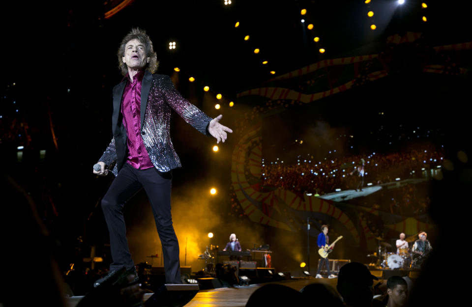 FILE - In this March 25, 2016 file photo, Rolling Stones frontman Mick Jagger performs in Havana, Cuba. The Rolling Stones are releasing a new version of their 1973 album “Goats Head Soup” with three unheard tracks. One of the new tracks is called “Scarlet” and features Led Zeppelin guitarist Jimmy Page. The album coming out on Sept. 4, 2020 will have a four-disc CD and vinyl box set edition with ten bonus tracks. The Stones also released a video for one of the unheard songs, called “Criss Cross.” (AP Photo/Enric Marti, File)