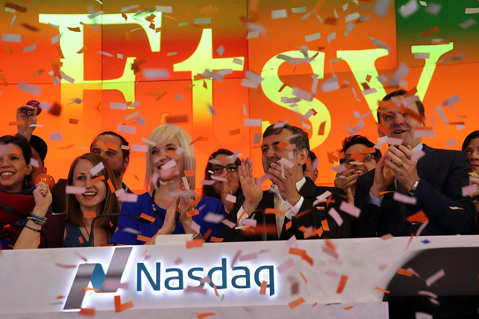 The CEO of the online marketplace Etsy, Chad Dickerson, stands with the CFO Kristina Salen on the floor of the Nasdaq as the company becomes a public company began under the ticker symbol