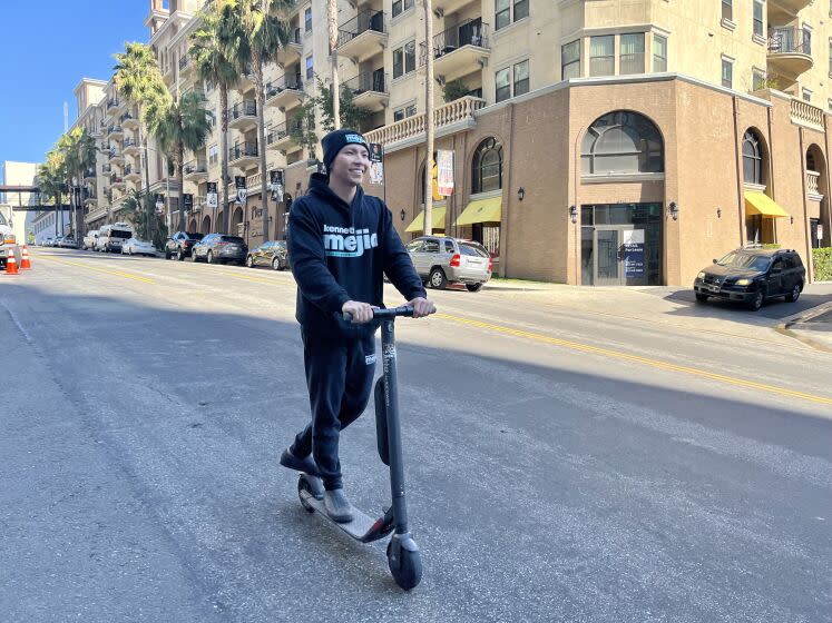 L.A. City Controller-elect Kenneth Mejia heading to his downtown campaign office.