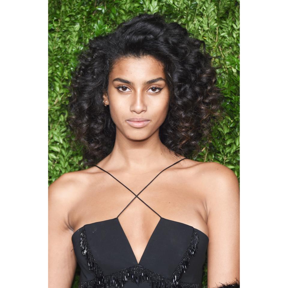 Imaan Hammam's Mid-Length Curly Layers