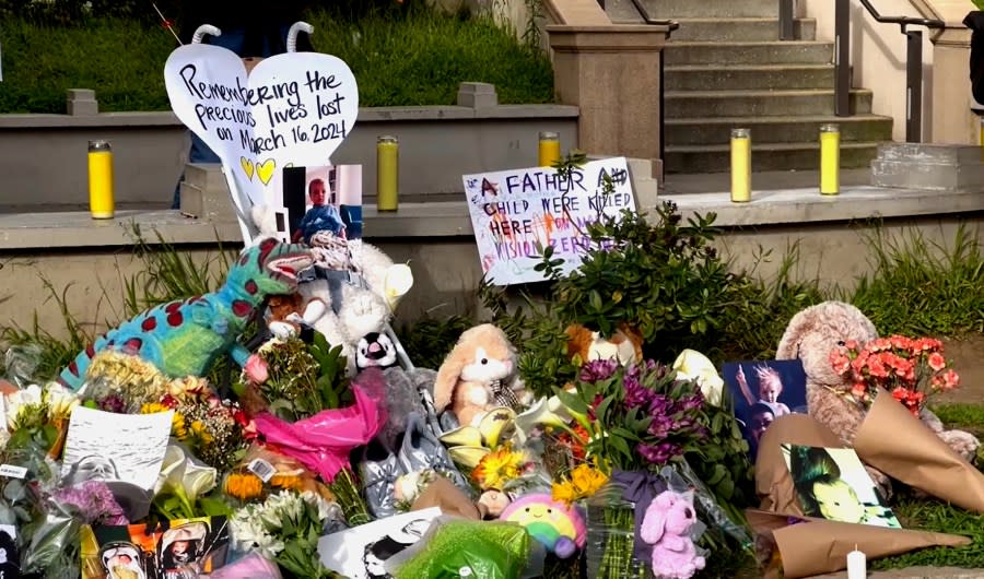 A memorial was created on March 18, 2024 at a San Francisco bus stop where a baby and his parents were killed by an SUV. (KRON4 Photo)