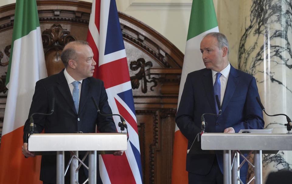Northern Ireland Secretary Chris Heaton-Harris, left, and Tanaiste Micheal Martin hold a joint press conference during the British-Irish intergovernmental conference at 100 Parliament Street in London, Monday April 29, 2024. Established under Strand 3 of the Belfast (Good Friday) Agreement, the British-Irish Intergovernmental Conference is a bilateral forum, aiming to take place three times per year, to bring together the British and Irish Governments to promote cooperation at all levels on all matters of mutual interest within the competence of both Governments. (Yui Mok/PA via AP)