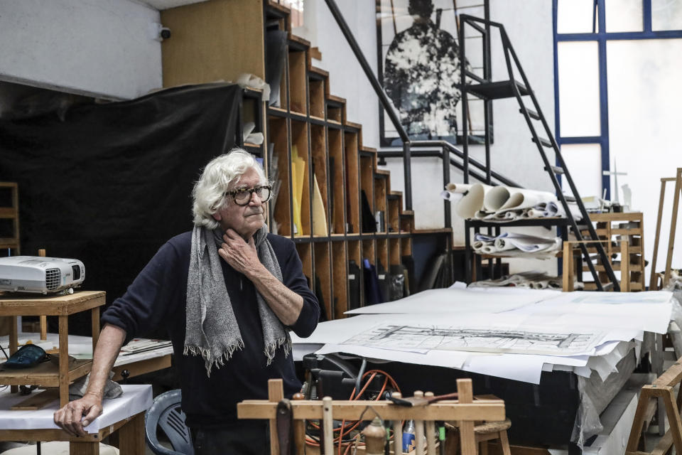 Italian artist Narcissus Quagliata stands in his studio in Valle de Bravo, Mexico, Wednesday, Oct. 25, 2023. The 81-year-old is the master of the glass-fusion technique. (AP Photo/Ginnette Riquelme)