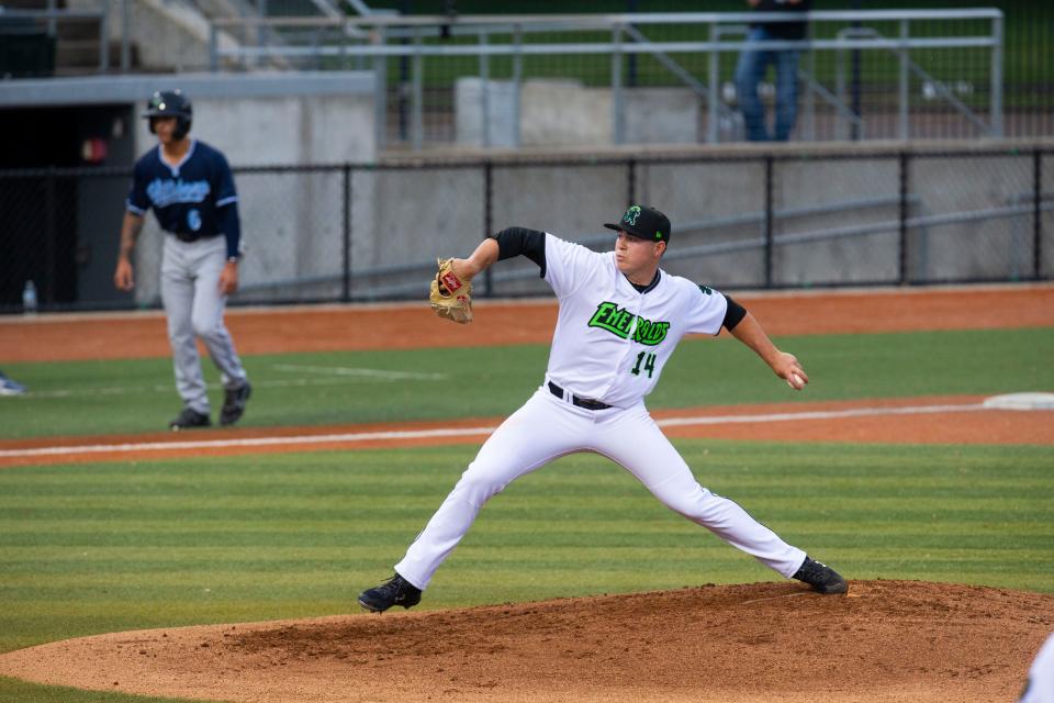 Eugene Emeralds pitcher Seth Corry, right, throws against Hillsboro with a player on third during the second inning at PK Park in Eugene in July 2021.