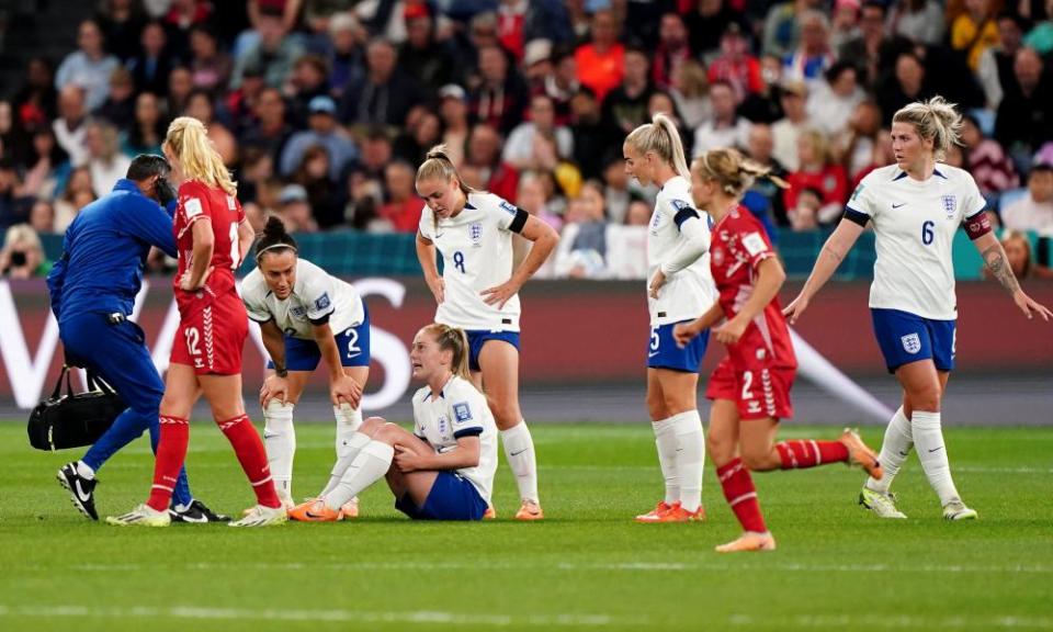 England players show their concern at Keira Walsh’s injury.