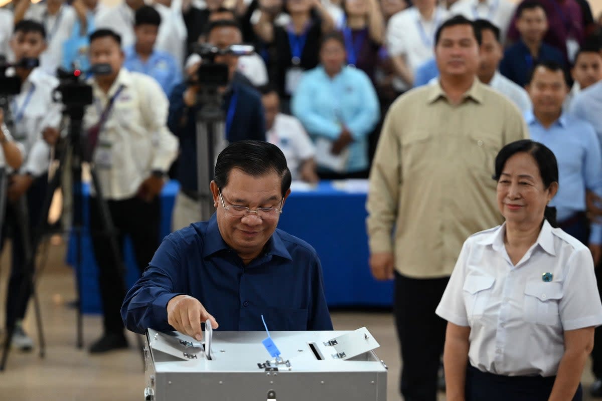 Cambodia’s Prime Minister Hun Sen casts his vote at a polling station in Kandal province on 23 July, 2023 during the general elections (AFP via Getty Images)