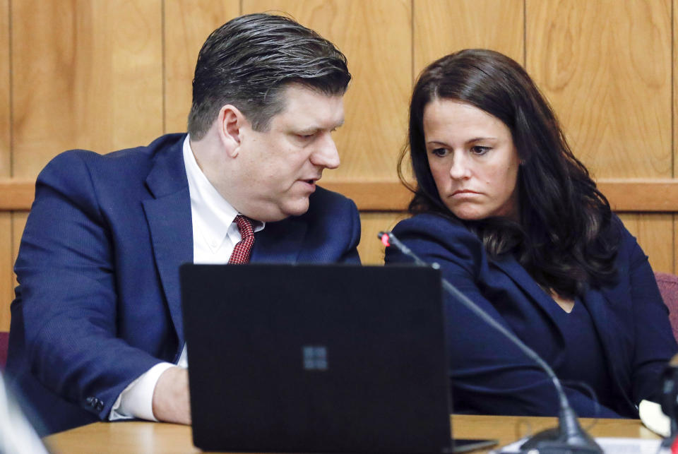 Defense attorneys Chad Frese and Jennifer Frese confer during a hearing for their client Cristhian Bahena Rivera at the Poweshiek County Courthouse in Montezuma, Iowa, on Thursday, July 15, 2021. Bahena Rivera was convicted of killing University of Iowa student Mollie Tibbetts in 2018. A judge delayed Bahena Rivera's sentencing after defense attorneys asserted authorities withheld information about investigations into a nearby sex trafficking ring the lawyers say could have been involved in the fatal stabbing. (Jim Slosiarek/The Gazette, Pool)