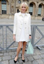 A fellow visitor to France during Fashion Week was recent Oscar nominee Naomi Watts ("The Impossible"), who looked chic in a simple Louis Vuitton shift dress and ivory-colored coat. As for her accessories... the black pumps were a bit jarring, but the mint-hued handbag was to die for. Don't you think? (3/6/2013)