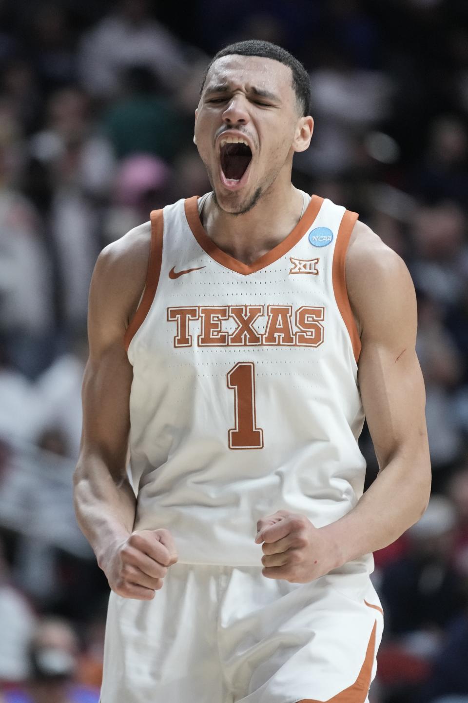 Texas' Dylan Disu celebrates after a second-round college basketball game against Penn State in the NCAA Tournament Saturday, March 18, 2023, in Des Moines, Iowa. (AP Photo/Morry Gash)