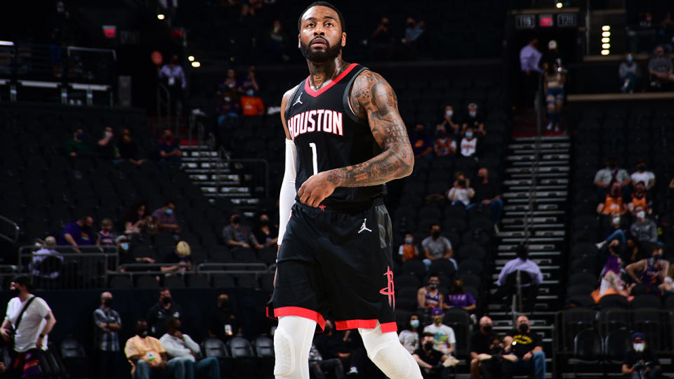 John Wall walking on court during a game