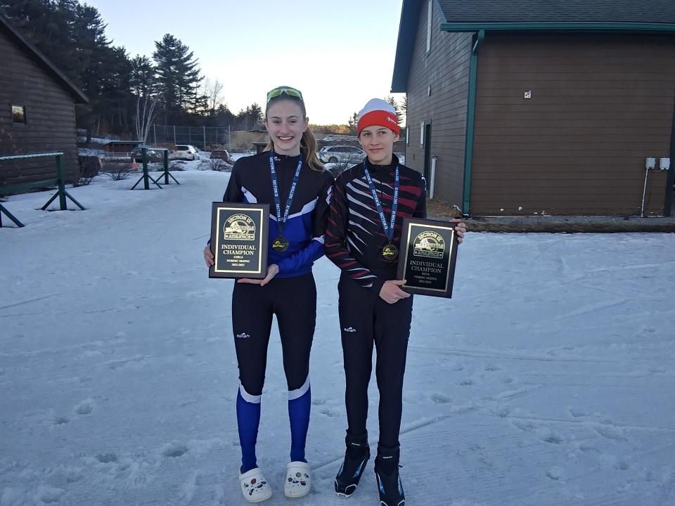Section 9 Nordic skiing champions Andie Psilopoulos of Wallkill, left, and New Paltz's Matei Jirka pose with their plaques after the section tournament Feb. 14, 2023.