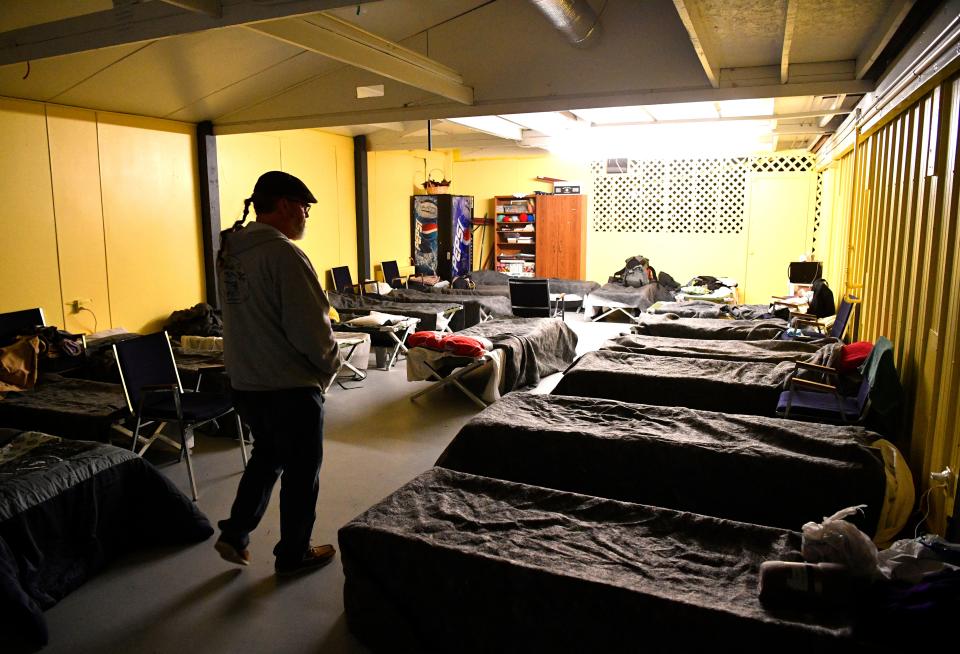 Kenny York, founder and CEO of Manna Cafe Ministries, walks through a warming shelter at a local church that will house homeless guests Jan. 28, 2019, in Clarksville, Tenn.