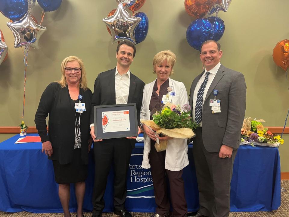 Case manager Donna Marie Everett, RN, of Dover is the recipient of the 2022 Nursing Excellence – Professional Mentoring Award at Portsmouth Regional Hospital. Pictured with Nancy Seskes, RN, associate chief nursing officer; Dean Carucci, market president, HCA New England Healthcare, and CEO of Portsmouth Regional Hospital, and Jacob Wiesmann, chief financial officer.