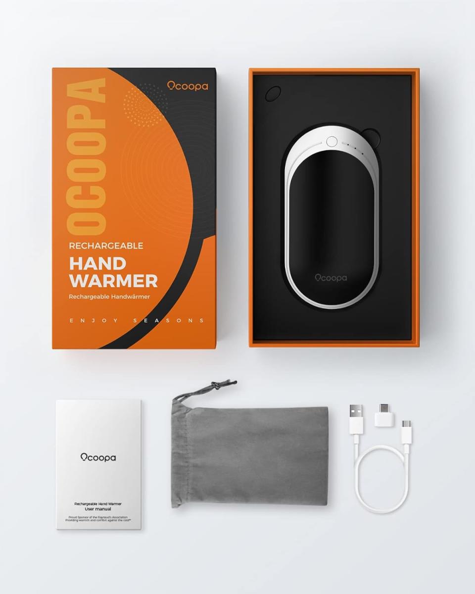 The hand warmer doubles up as a phone charger. (OCOOPA / Amazon)