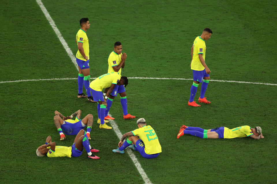 AL RAYYAN, QATAR - DECEMBER 09: Brazil players react after defeat in the penalty shoot-out during the FIFA World Cup Qatar 2022 quarter final match between Croatia and Brazil at Education City Stadium on December 09, 2022 in Al Rayyan, Qatar. (Photo by Alex Pantling/Getty Images)