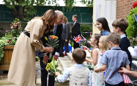 Philip May and Melania Trump at the 10 Downing Street garden party - Credit: REX