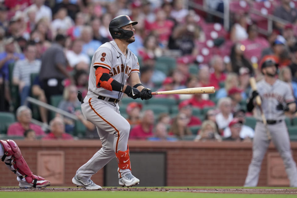 San Francisco Giants' Michael Conforto watches his two-run double during the first inning of a baseball game against the St. Louis Cardinals Tuesday, June 13, 2023, in St. Louis. (AP Photo/Jeff Roberson)