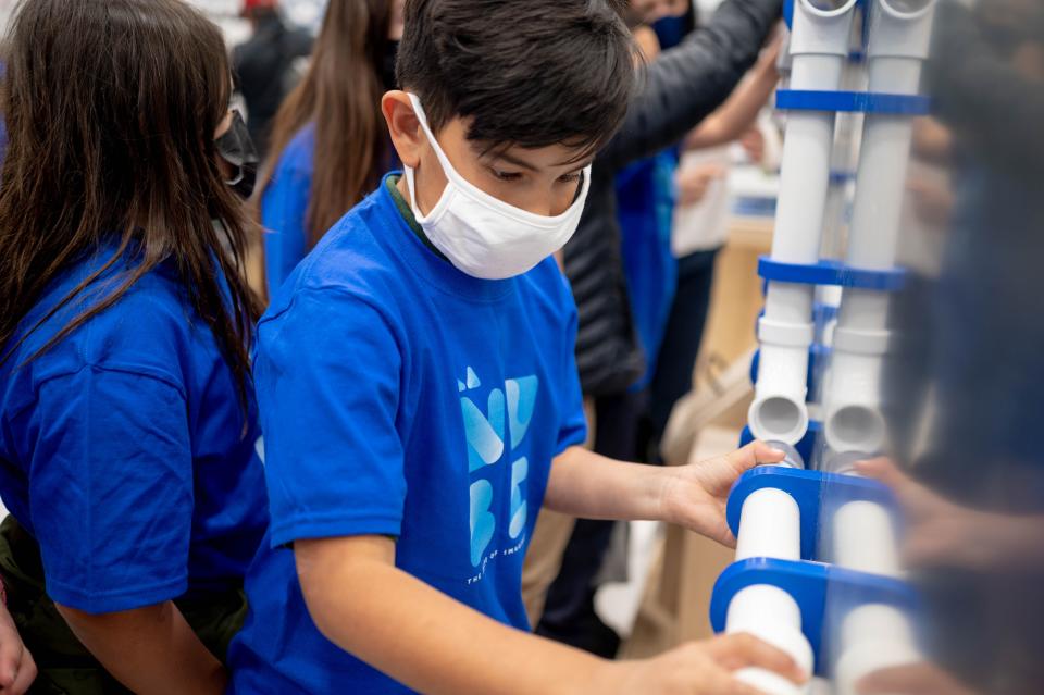 Adrian Cerda plays with a prototype exhibit that will be party of La Nuble, Wednesday, March 23.