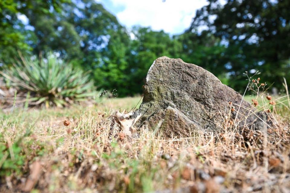 “A rock had to suffice for a headstone,” William Hill said about the unmarked graves that lie beneath the earth at Moore’s Sanctuary AME Zion Church.