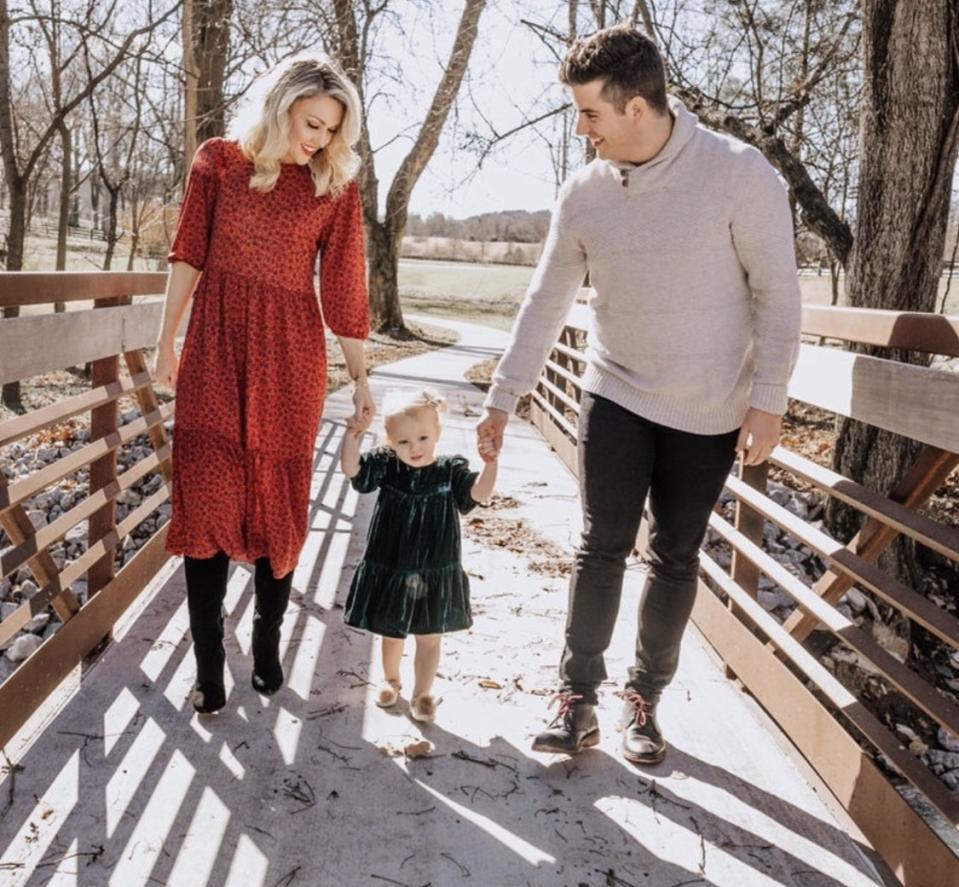 Amanda Wilcox Patterson, her husband, and their two-year-old daughter Adalyn