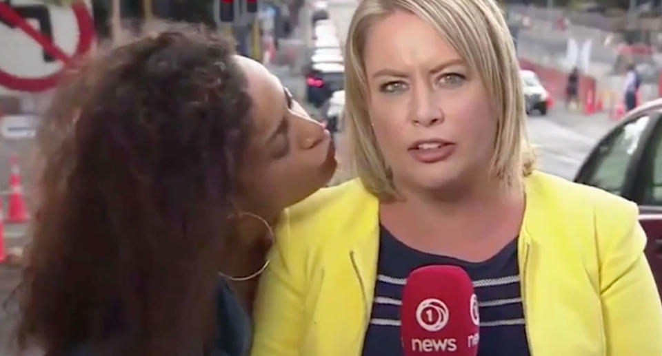 Reporter's 'outstanding' reaction to 'silly woman' trying to kiss her on-air