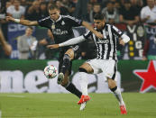 Real Madrid's Pepe in action with Juventus' Stefano Sturaro Reuters / Sergio Perez