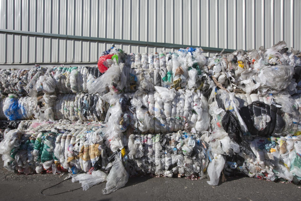 Compressed blocks of plastic waste, which would have been exported to China, pile up at Far West Recycling in Hillsboro, Oregon. (Photo: Natalie Behring/Getty Images)