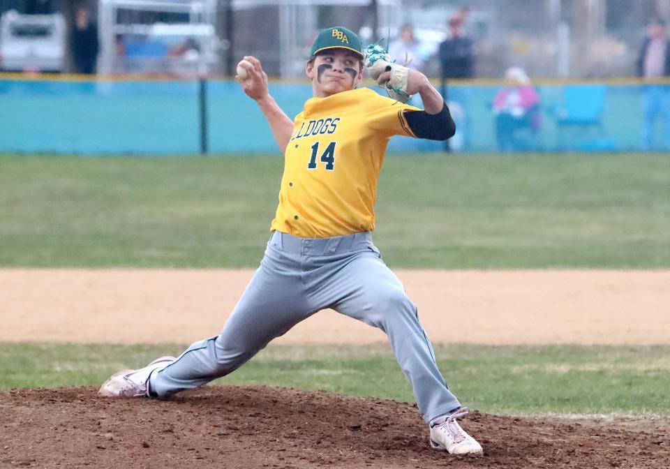 Burr & Burton pitcher Seb Dostal fires a pitch to the plate during the Bulldogs 1-0 loss to South Burlington at SBHS this season.