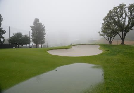 February 14, 2019; Pacific Palisades, CA, USA; Standing water on the second course fairway during a stoppage in play in the first round of the Genesis Open golf tournament at Riviera Country Club. Mandatory Credit: Gary A. Vasquez-USA TODAY Sports