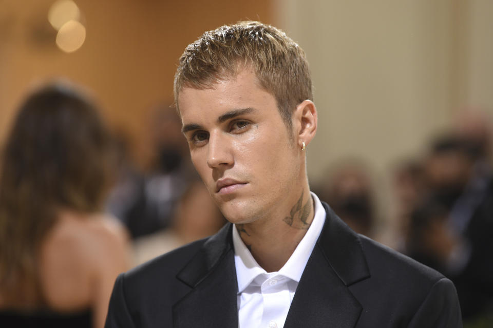 FILE - Justin Bieber attends The Metropolitan Museum of Art's Costume Institute benefit gala on Sept. 13, 2021, in New York. Bieber leads the iHeartRadio Music Award nominations. The awards show will air from Los Angeles on March 22. (Photo by Evan Agostini/Invision/AP, File)