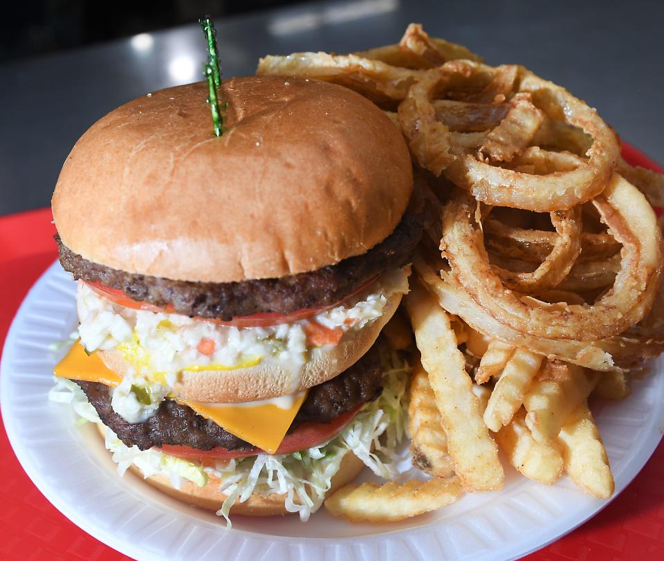 The Beacon Drive-In in Spartanburg was named one of the best burger restaurants in the South by Southern Living. This is a Beacon Burger: Double Cheeseburger with Mayo, Mustard, Lettuce, Tomato and the Beacon's fresh slaw. At the Beacon Drive-in A-plenty means a generous order of fresh cut onion rings and fries.