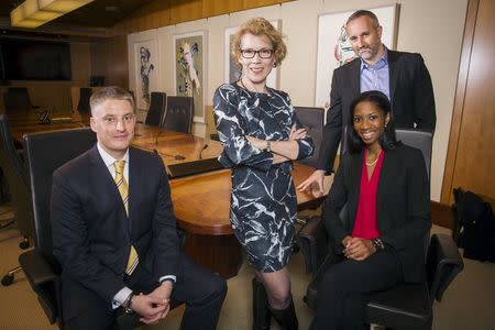 LGBT activists (L-R) Matt Koehler, Jennifer MacDonald, Lanaya Irvin, and Daniel Maury pose for a photograph in New York April 13, 2015. REUTERS/Lucas Jackson