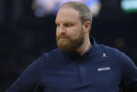 Memphis Grizzlies coach Taylor Jenkins watches from the bench during the first half of Game 6 of the team's NBA basketball Western Conference playoff semifinal against the Golden State Warriors in San Francisco, Friday, May 13, 2022. (AP Photo/Tony Avelar)