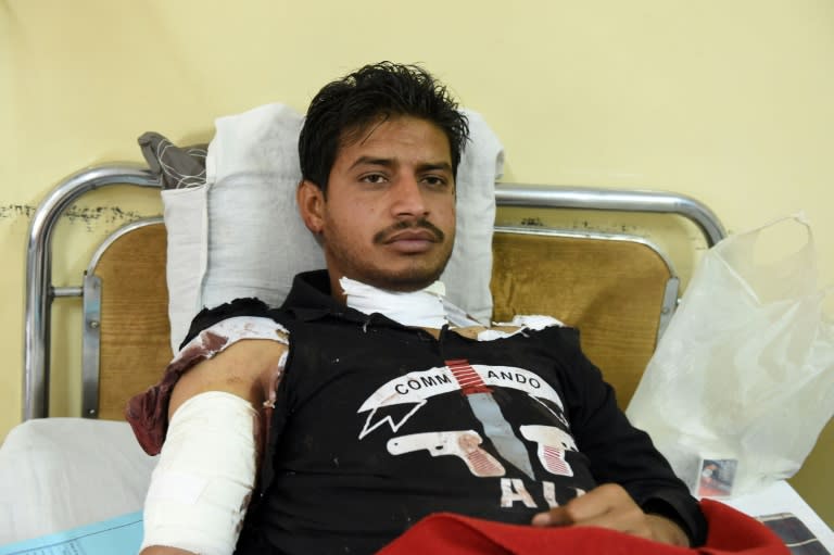 An injured Pakistani policeman is treated in hospital in Quetta on October 25, 2016 after an attack by militants targeting Balochistan Police College