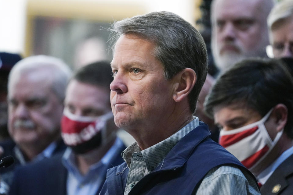 FILE - In this April 3, 2021 file photo, Georgia Gov. Brian Kemp speaks during a news conference at the State Capitol in Atlanta. Republicans are gearing up for midterm gubernatorial races by trumpeting the party’s more hands-off approach to the coronavirus pandemic, attempting to flip the script on an issue that helped Democrats win the White House and control of Capitol Hill in 2020. Kemp recently described his stewardship of a “measured reopening” as the way to “protect lives against COVID-19, but also protect your livelihood and your paycheck.” (AP Photo/Brynn Anderson, file)