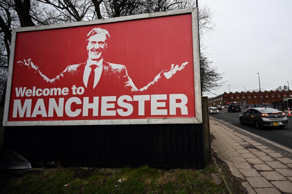 A billboard hails the arrival of Sir Jim Ratcliffe at Old Trafford (AFP via Getty Images)