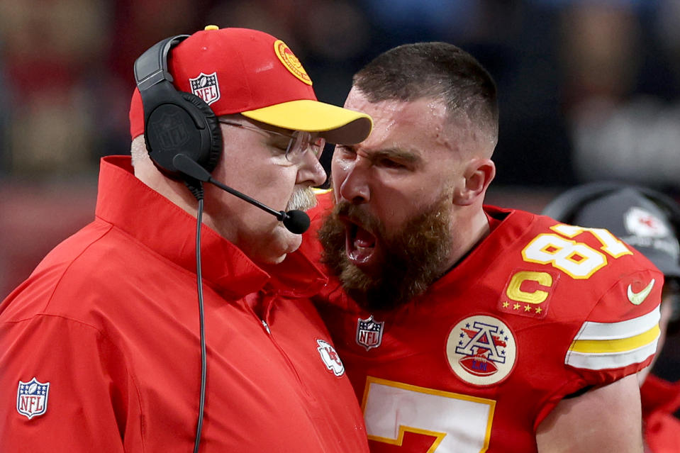 Travis Kelce yells.